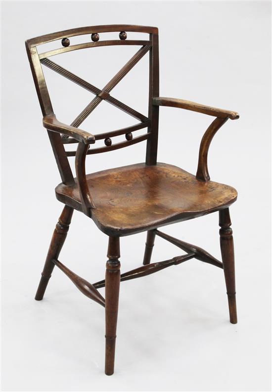 A 19th century fruitwood and elm Mendlesham armchair,